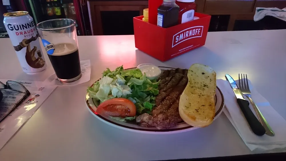 Rib Eye Steak with Salad and Garlic Bread
